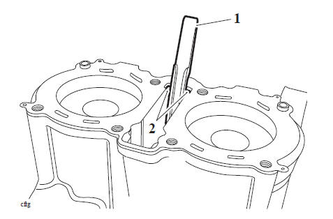 Camshaft Drive Chain Rubbing Blade - Removal