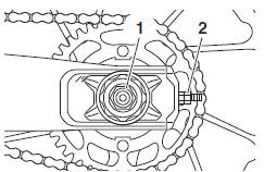 To adjust the drive chain slack